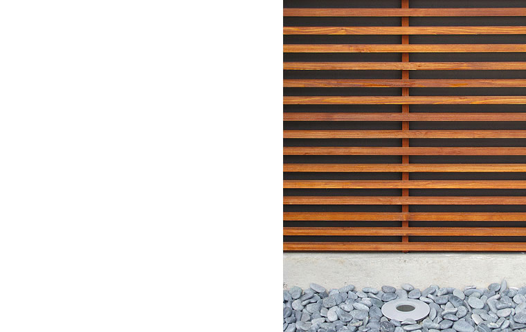 modern cedar trellis, river rock